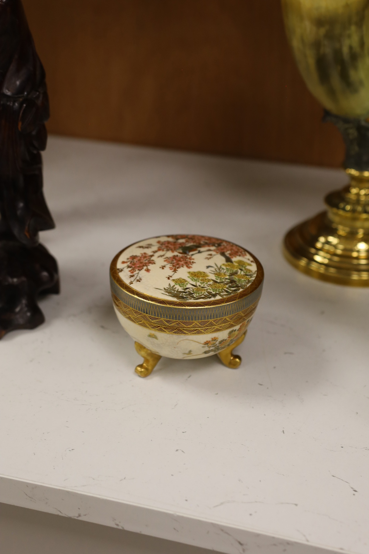 A late 19th century Japanese Satsuma ‘hundred antiques’ gosu blue pot pourri vase and three later items of Satsuma, including a bowl and cover a bowl on stand, a box and cover, tallest 18.5cm high. Condition - vase cover